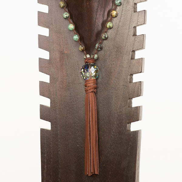 Long beaded necklace with crystal and leather tassel